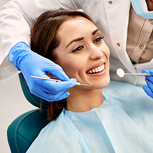 Warren C. Baine, D.M.D. | Extractions, Crown Lengthening and Initial Oral Examination